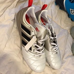 Women’s soccer cleats.  Adidas size 6.5.  NWT.